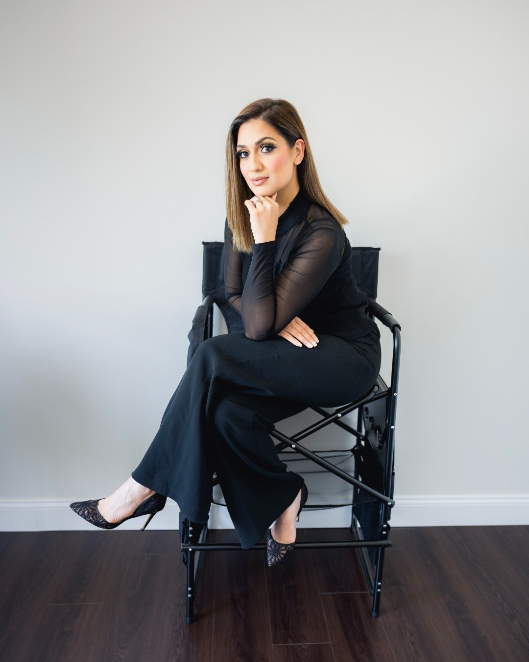 Full length seated brand portrait